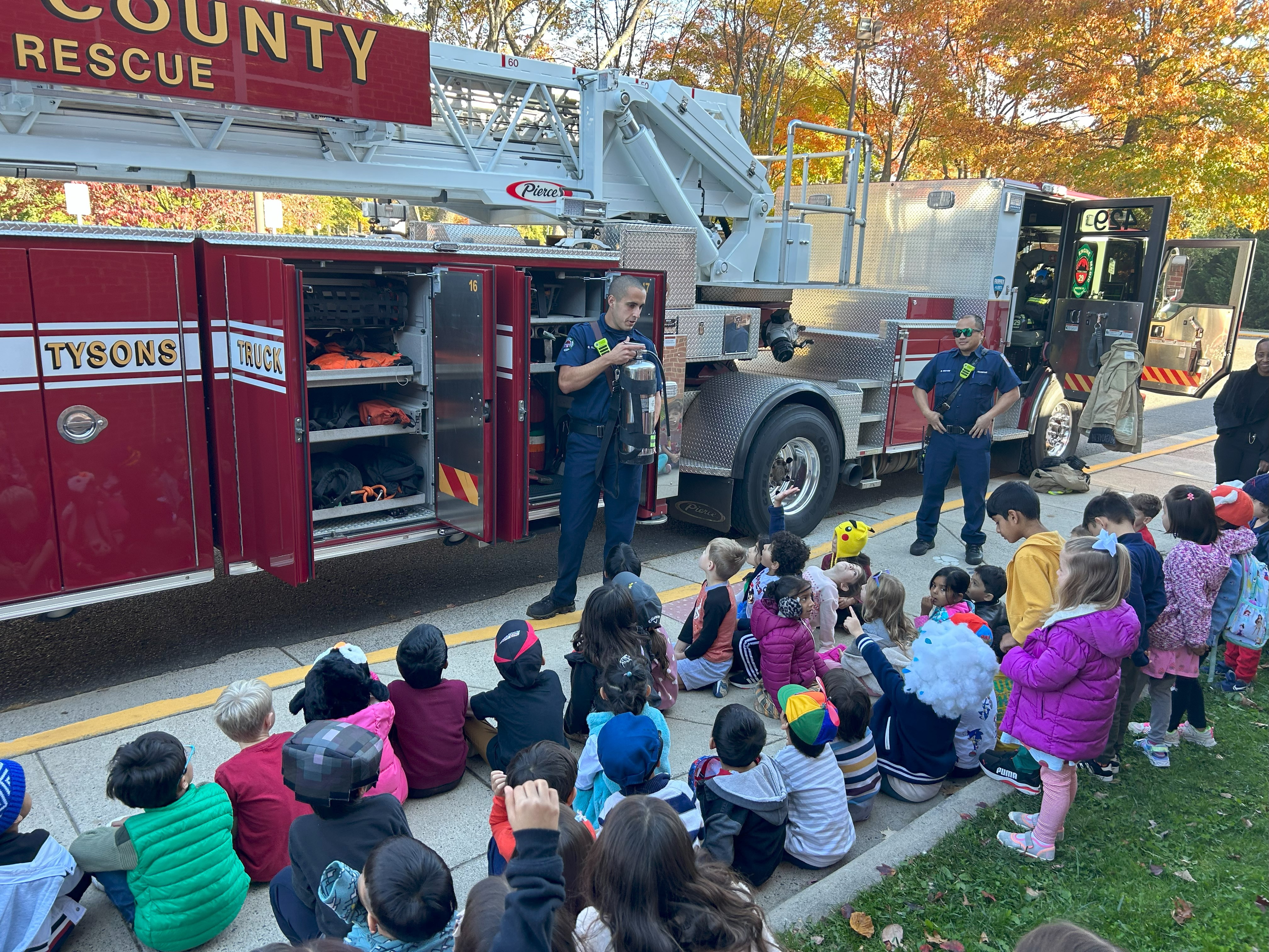 students listening to fire department presentation