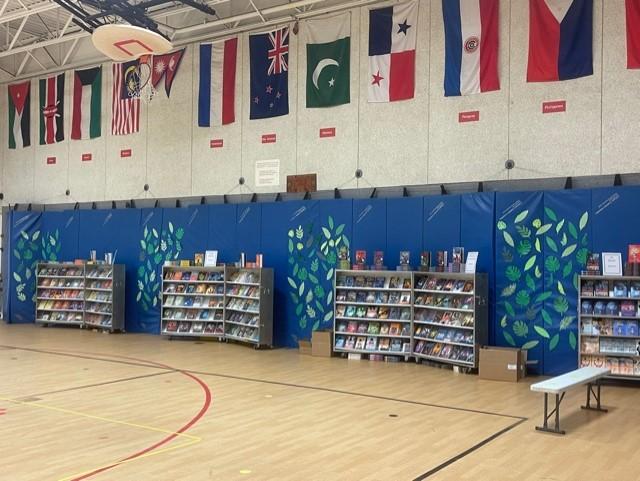 Hill, Bjelica Take Book Mobile To Hennepin Elementary